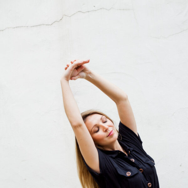 Woman practices yoga to help with holiday stress relief