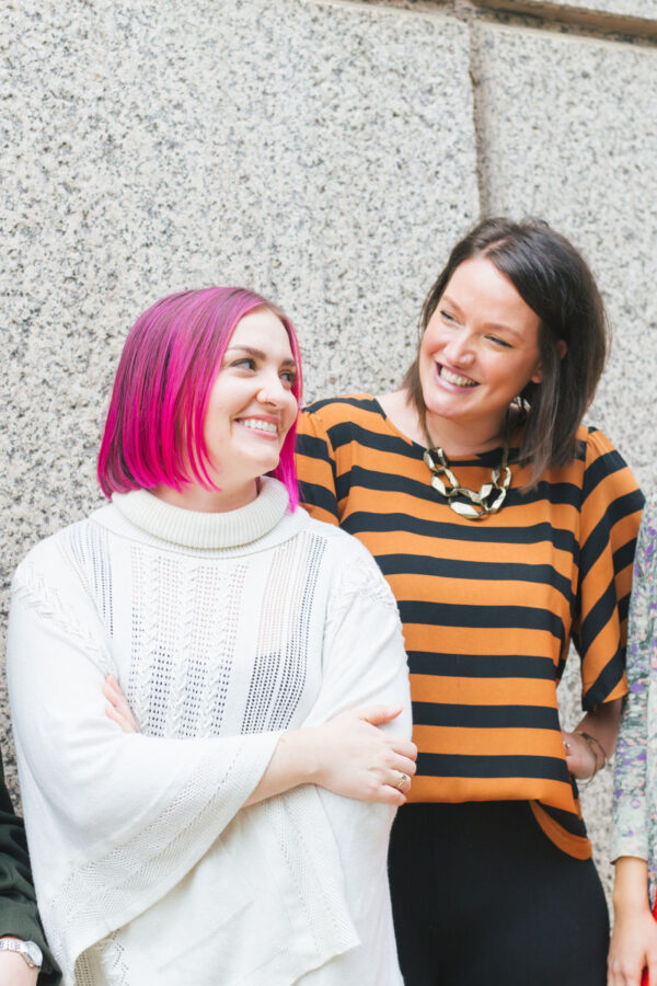 DBT Therapists at Therapy for Women smiling at each other