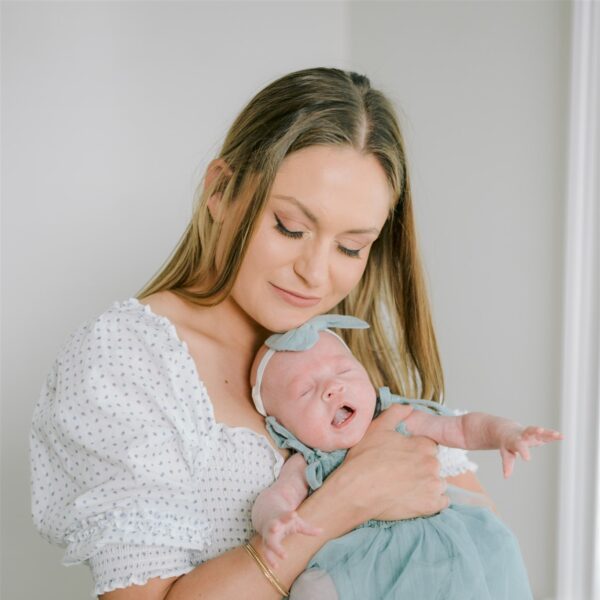 author with her newborn baby learning to manage overstimulation