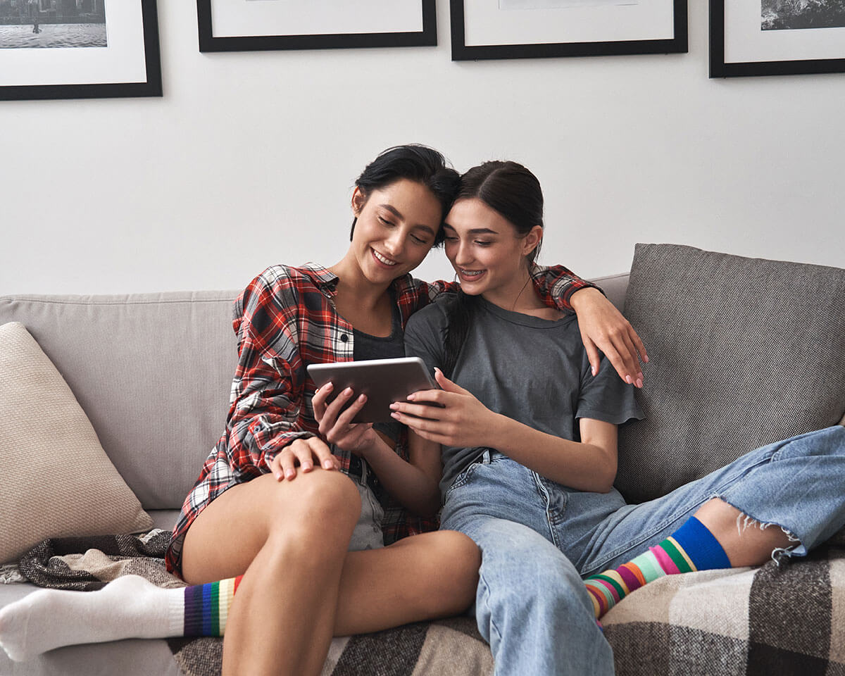 photo of two women in a virtual LGBTQ+ couples therapy session at Therapy For Women Center