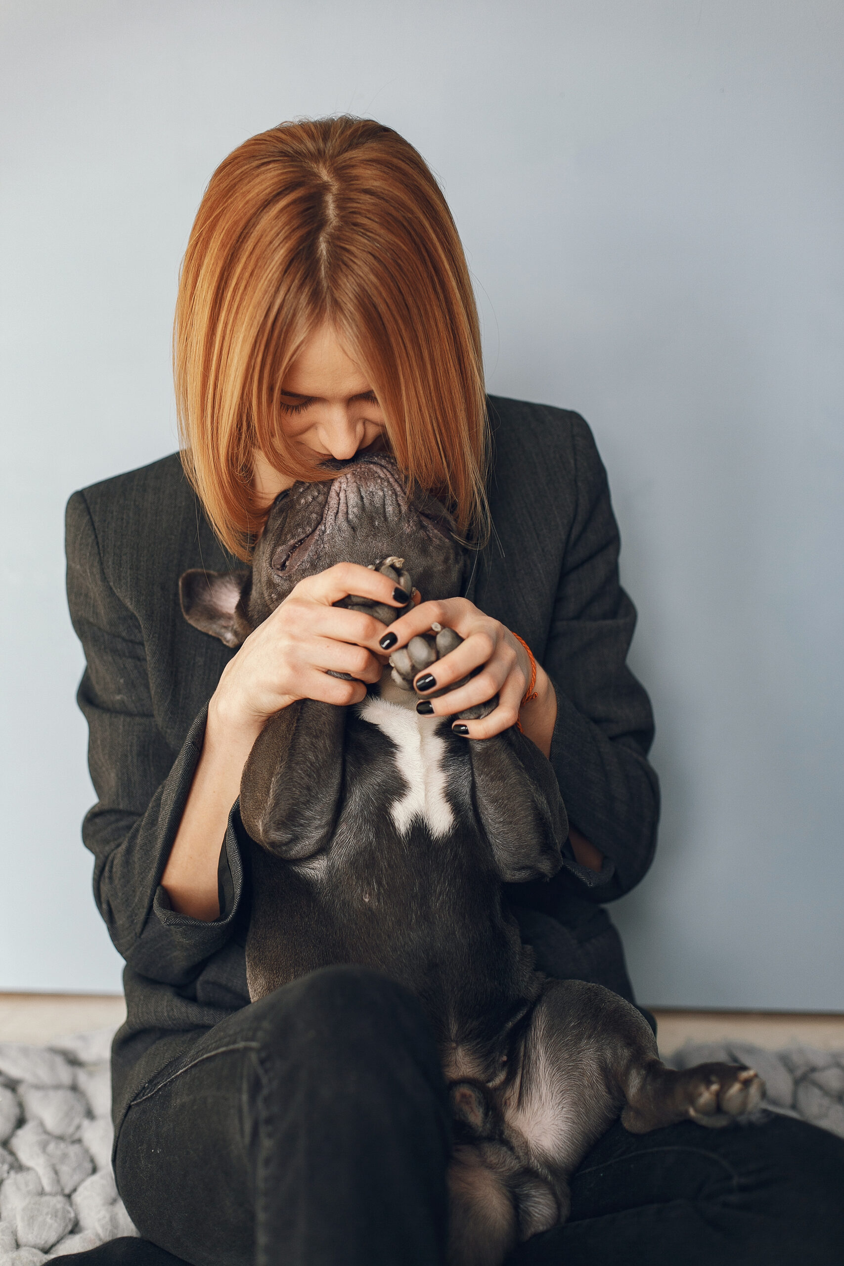photo of woman and pet dog for article on pet grief