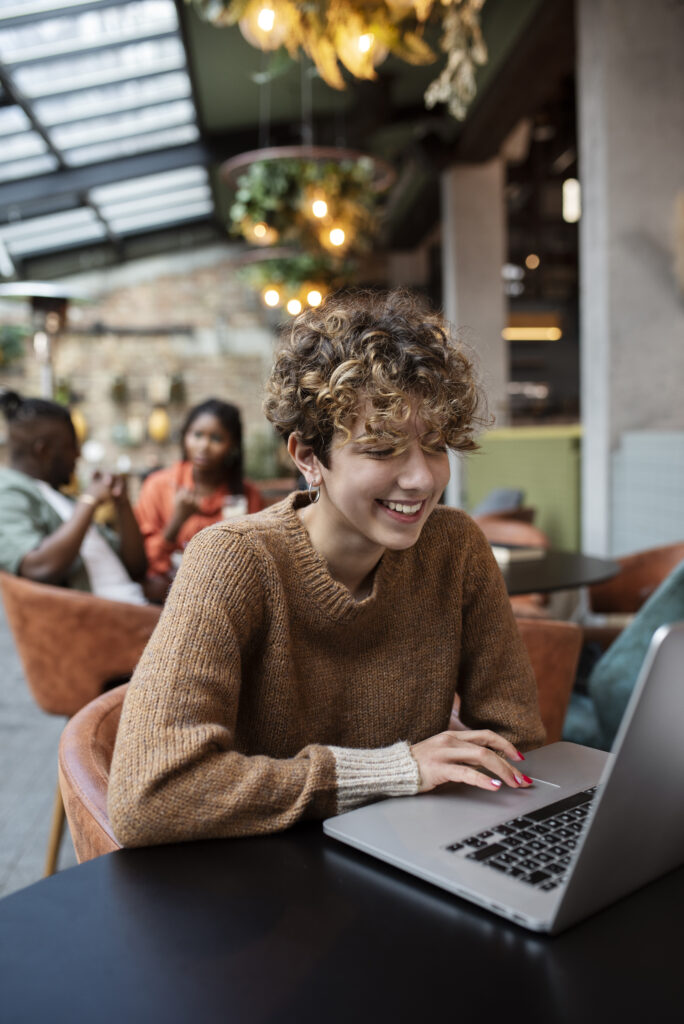 woman on the internet smiling because she is not engaging in all or nothing thinking