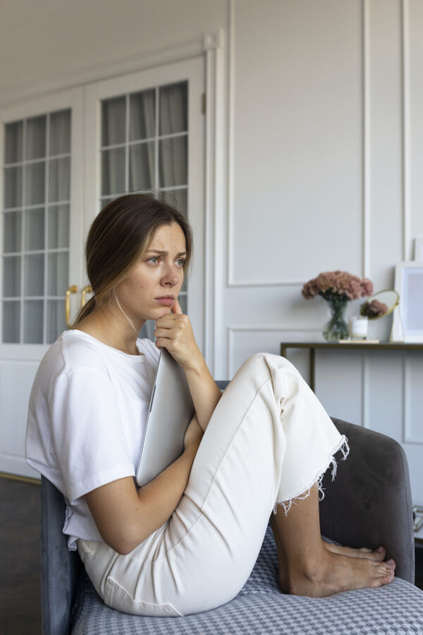 Portrait of woman with laptop in functional freeze
