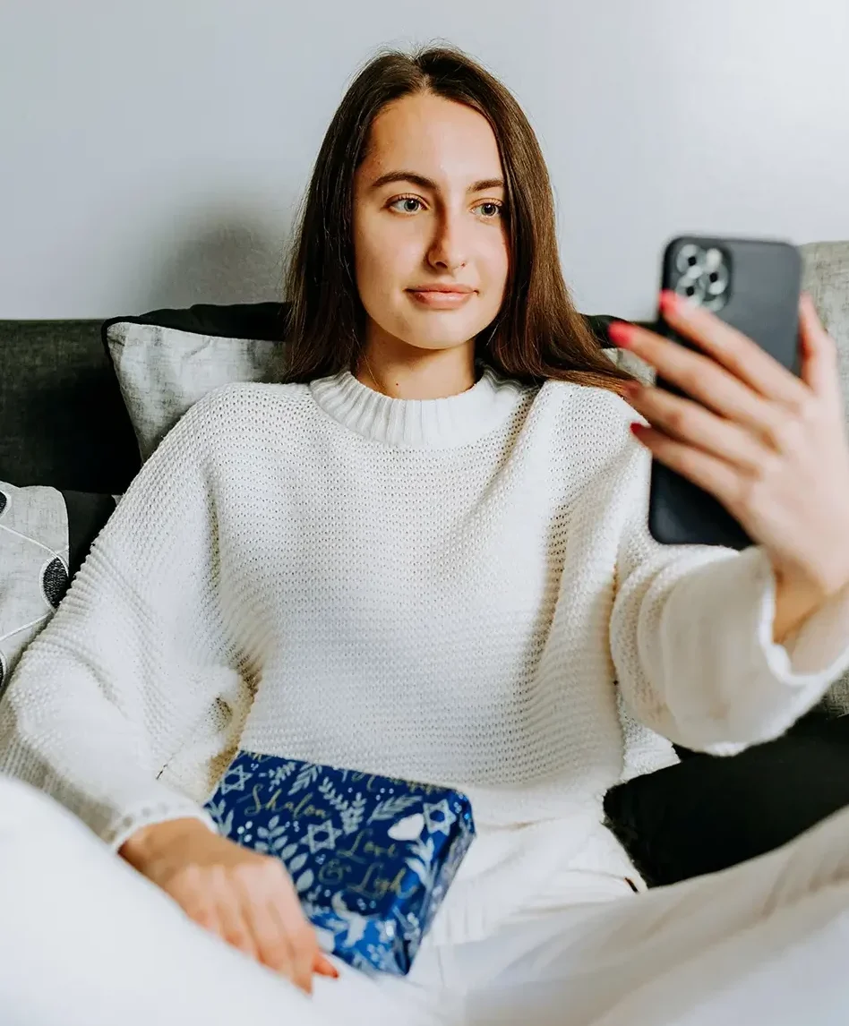 woman participating in online therapy