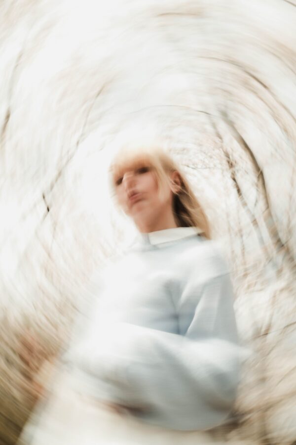abstract photo of woman for article on how to stop spiraling thoughts & rumination