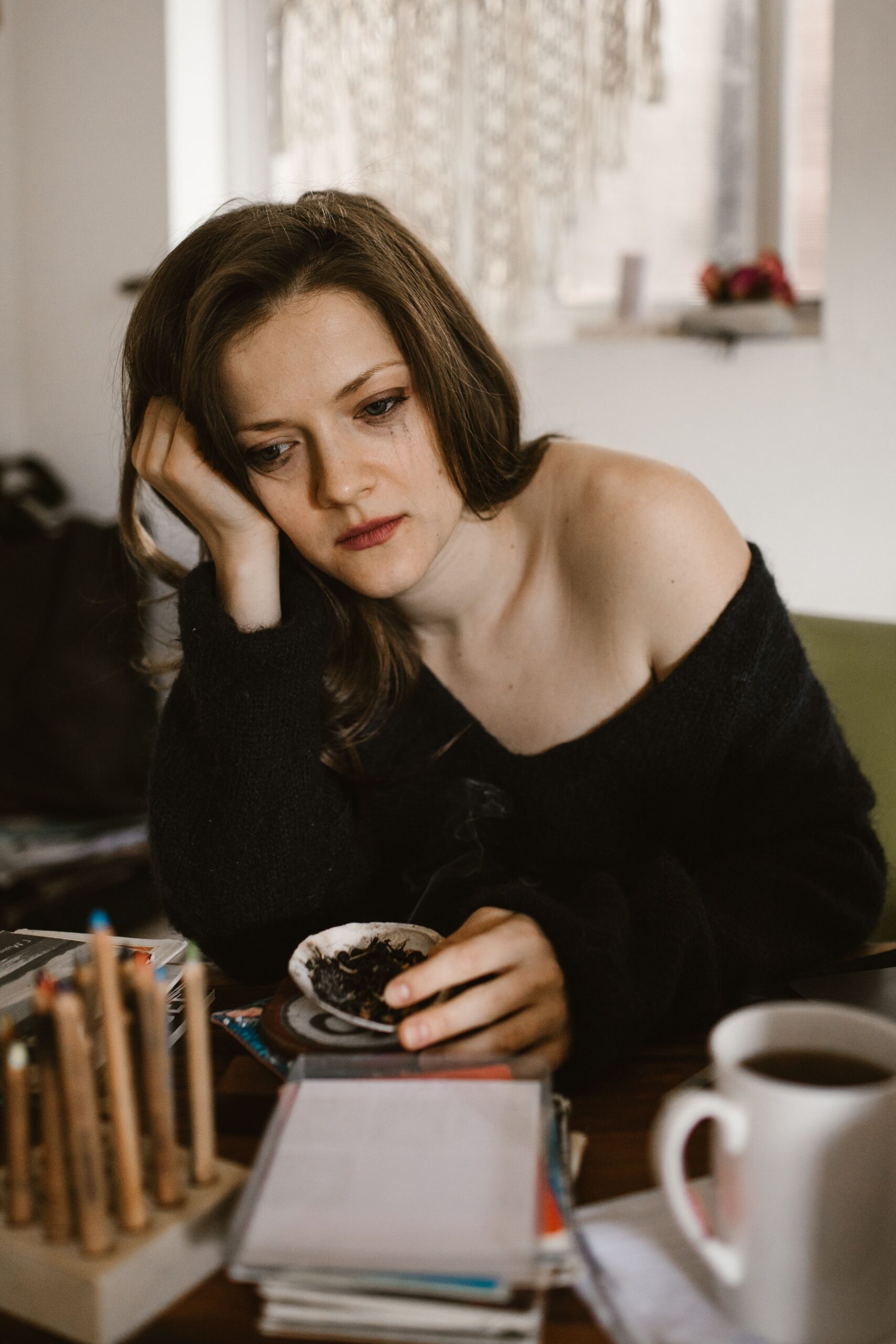 Woman struggling to get over a breakup.