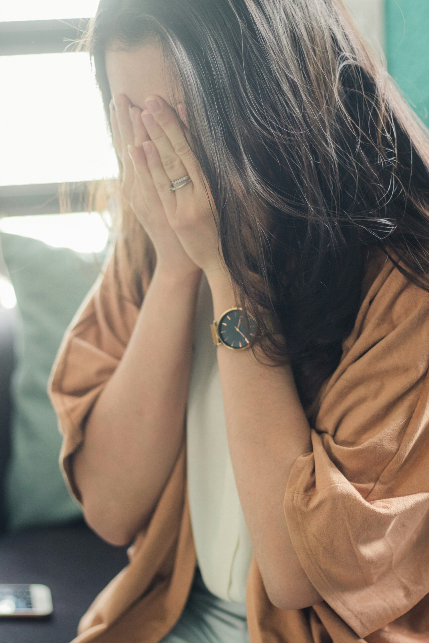 woman wondering, why can't I cry? even though she's sad